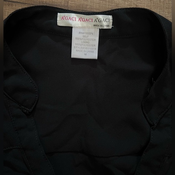 A'GACI A'GACI BLACK DRESS.
Size medium - Picture 5 of 8